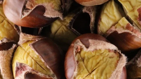 Chestnuts cooked in the oven Stock Footage 95703993