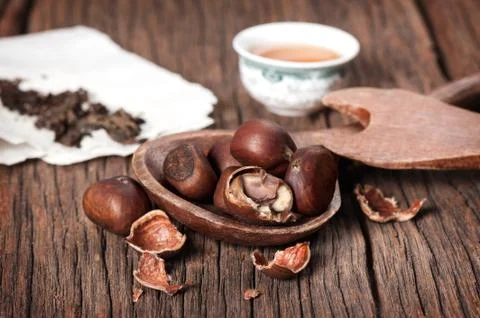 Chestnuts with cracked Stock Photos