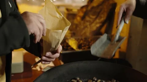 Chestnuts from an open grill Stock-Footage 232001103