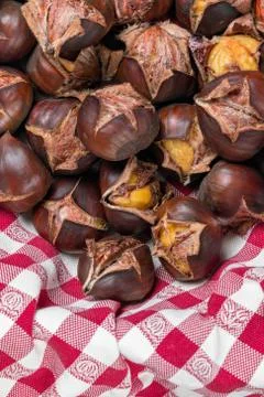 Chestnuts in the red basket Stock Photos