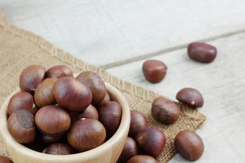 Chestnuts roasted in bowl. Stock Photos