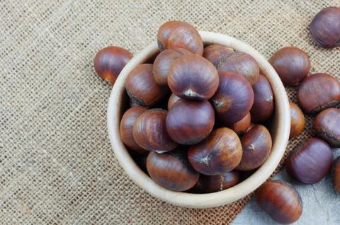 Chestnuts roasted in a bowl. Stock Photos