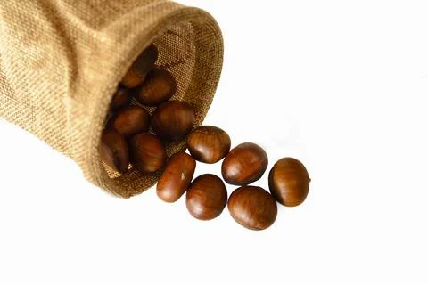 Chestnuts roasted on a white background. Stock Photos
