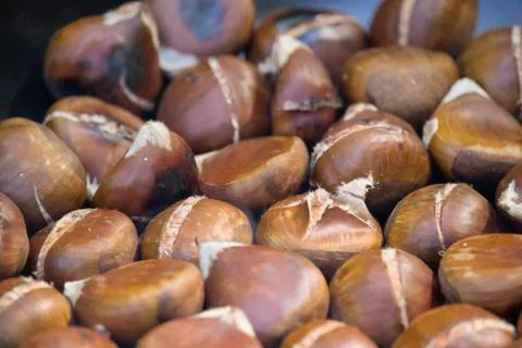 Chestnuts roasting on an open fire Stock Photos