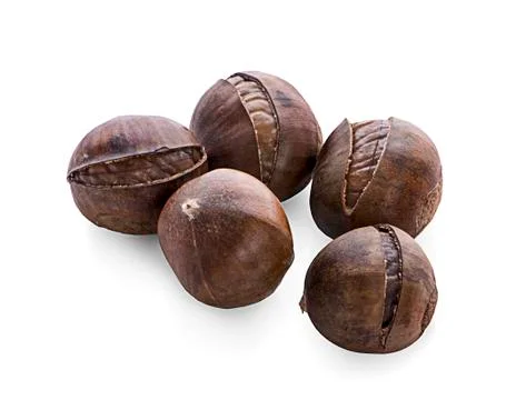 Chestnuts on white background. Stock Photos