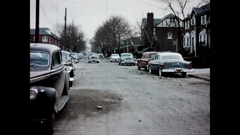 Chevrolet pulls up and guys get out, vintage Stock Footage 125838069