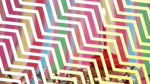 Chevron pattern design over burning candle on a cupcake against colorful striped Stock Footage 162983717