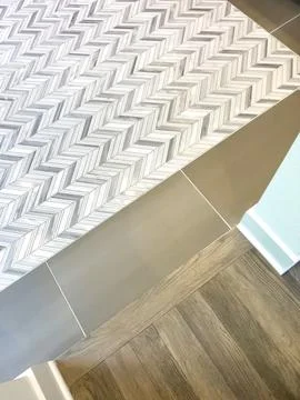 Chevron tile pattern on bathroom shower wall Stock Photos