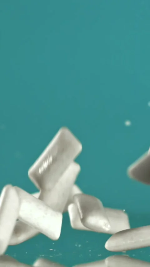 Chewing gum falls on the table. Filmed on a high-speed camera at 1000 fps Stock Footage 335373849