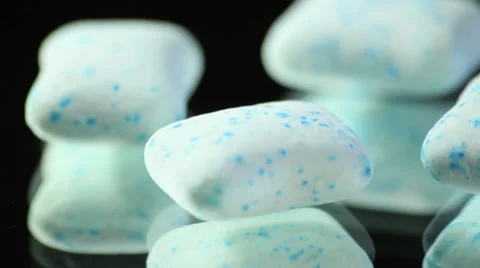 Chewing gums rotating close up studio Stock Footage 33817981
