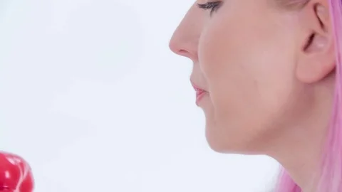 Chewing a red pepper really slowly Stock Footage 83725778