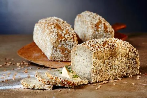 Chia and spelt bread with cream cheese and garden cress Stock Photos