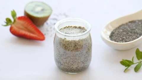 Chia Pudding Decorated With Kiwi and strawberry slices Stock Footage 111429877