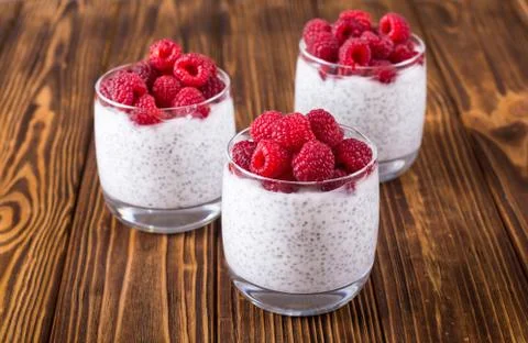 Chia pudding in glass with raspberry Stock Photos
