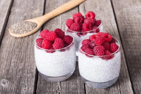 Chia pudding in glass with raspberry Stock Photos