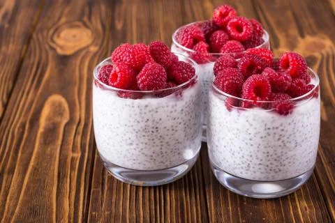 Chia pudding in glass with raspberry Stock Photos