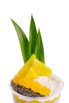 Chia pudding with pineapple isolated on white Chia pudding with pineapple ... Stock Photos
