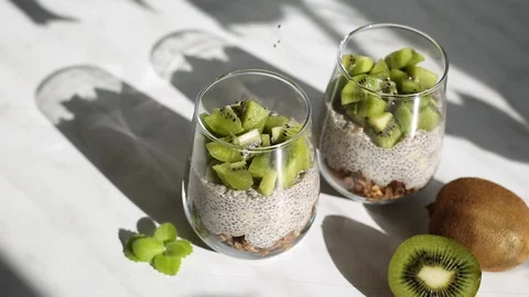 Chia seed pudding with coconut milk and kiwi Stock Footage 128347509