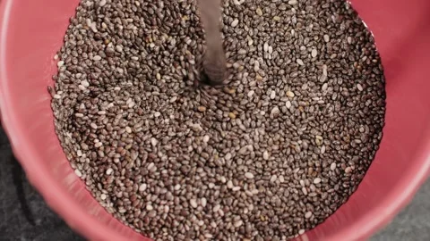 Chia seeds close-up macro. Dry healthy ingredient. Healthy superfood rich in Stock Footage 257086671