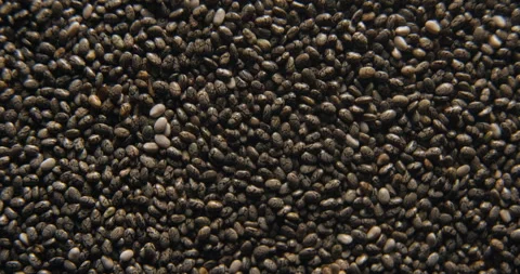 Chia seeds close up studio shot over rotating Video stock 334255632