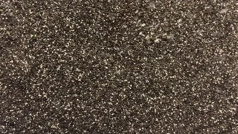 Chia seeds Falling (Wide Windy Slowmo) Stock-Footage 81808829