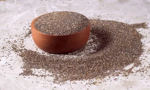Chia seeds in wood cup Stock Photos
