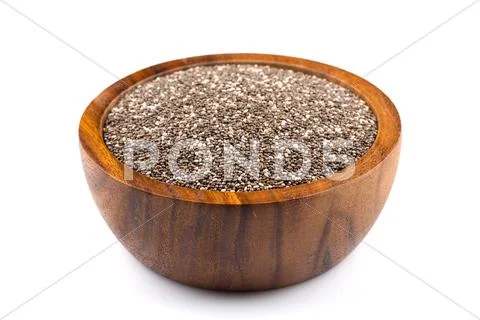Chia seeds in wooden bowl Stock Photos
