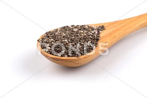 Chia seeds in wooden spoon Stock Photos