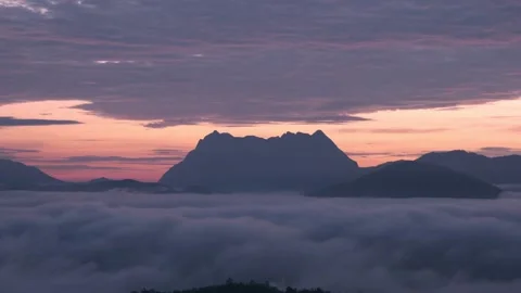 Chiang dao mountain and clouds fog with colorful sky in the morning. Stock Footage 230092598