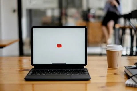 Chiang Mai, Thailand - AUG 26, 2021 : Woman using a tablet to connect to YouTube Stock Photos