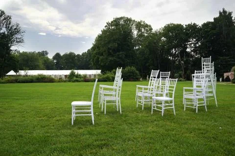 Chiavari chairs on grass. Stock Photos