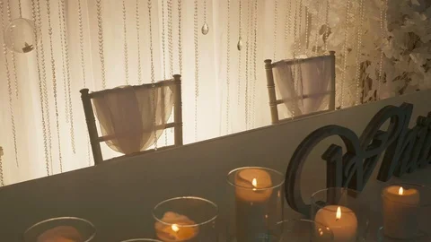 Chiavari chairs at the table with candles White Hall inscription Stock Footage 97715431
