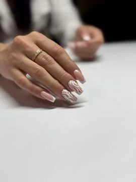 Chic Almond-Shaped Marble-Effect Manicure Display Stock Photos