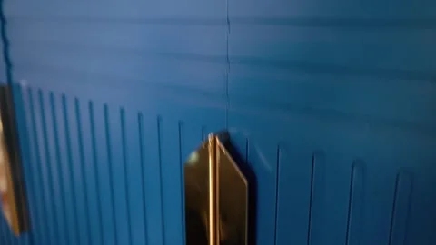 Chic Blue Cabinet with Bold Yellow Handles Vídeos de archivo 304662568