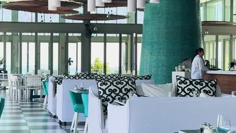 Chic Dining Area with Turquoise Accents Stock Footage 306912731