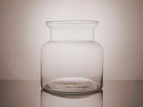 Chic glassware set bathed in soft backlight and enhanced by helium filter f.. Stock Photos
