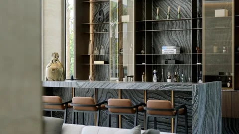 Chic kitchen bar with marble island, four chairs and glass shelves with various Stock Footage 242943721