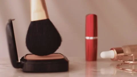 Chic make-up products on marble table, powder, lipstick and brush as background Stock Footage 135071934