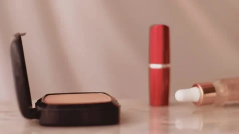 Chic make-up products on marble table, powder, lipstick and brush as background Stock Footage 135072691