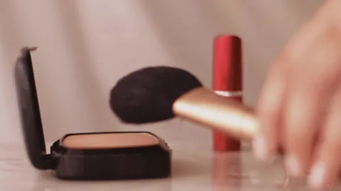 Chic make-up products on marble table, powder, lipstick and brush as background Stock Footage 135240345