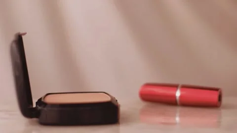 Chic make-up products on marble table, powder, lipstick and brush as background Stock Footage 135240716