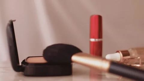Chic make-up products on marble table, powder, lipstick and brush as background Stock Footage 135240964