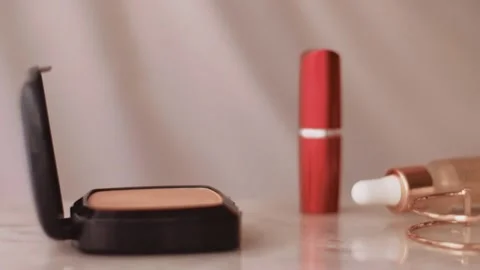 Chic make-up products on marble table, powder, lipstick and brush as background Stock Footage 135241202