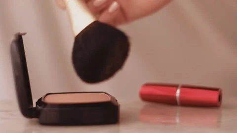 Chic make-up products on marble table, powder, lipstick and brush as background Stock Footage 153922933