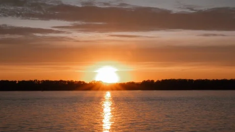 Chic summer sunset on the background of the river Stock Footage 126006128