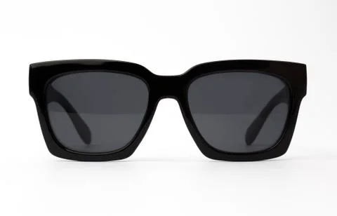 Chic sunglasses with black plastic frame isolated on white background, front Stock Photos
