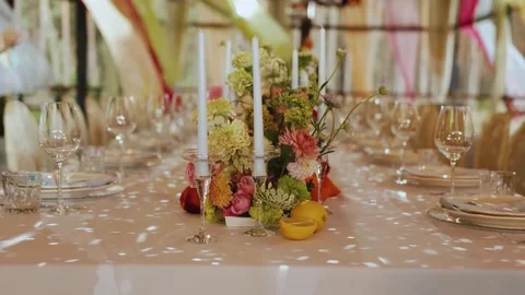 Chic wedding table setup, Sophisticated wedding table with candles and flowers Stock Footage 324677574