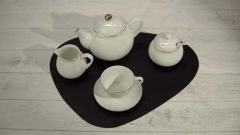 Chic White Tea Service on Black Tray on Light Wood Table Stock Footage 268111796