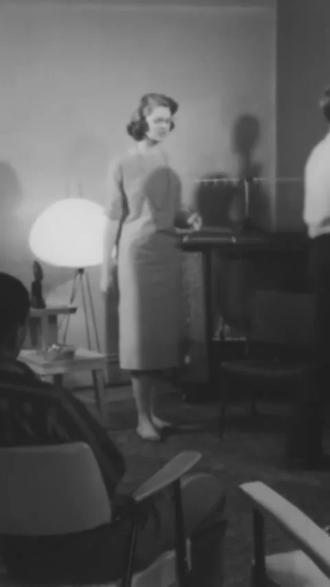 CHICAGO - 1959 - In a discussion about jazz, a black man argues with white Stock Footage 342829140