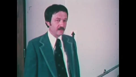 CHICAGO - 1970s - Mr. Barkley observes a janitor mopping the hospital floors. Stock Footage 340587106
